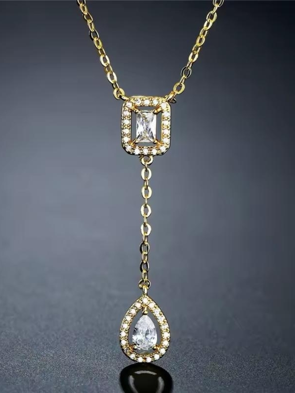 Gold Teardrop and Baguette Pendant Necklace with Clear Stones